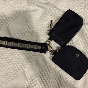 **SOLD** Lululemon Black and Gold Wristlet